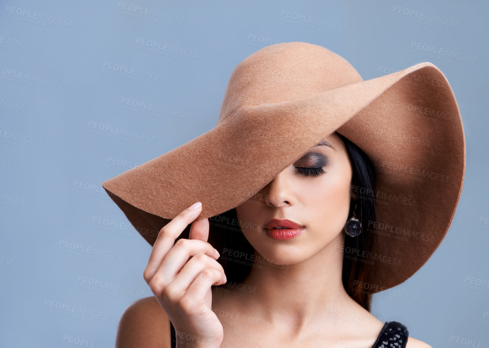 Buy stock photo Beauty, cosmetics and woman in hat with glamour, confidence and vintage style in studio. Classic, chic and elegant model in cool aesthetic with girl on grey background for luxury, grace and makeup.