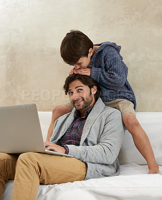 Buy stock photo Father, son and laptop on sofa with love, playing and happiness for bonding in living room of home. Family, man and child with remote work, smile and relax on couch in lounge of house with trust 