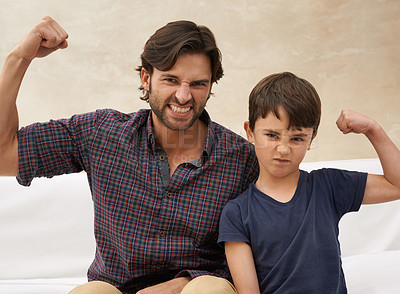 Buy stock photo Sofa, muscle and portrait of father and child flex for bonding, fun childhood and relax together. Family, home and strong dad with young son on couch for love, care and support in living room