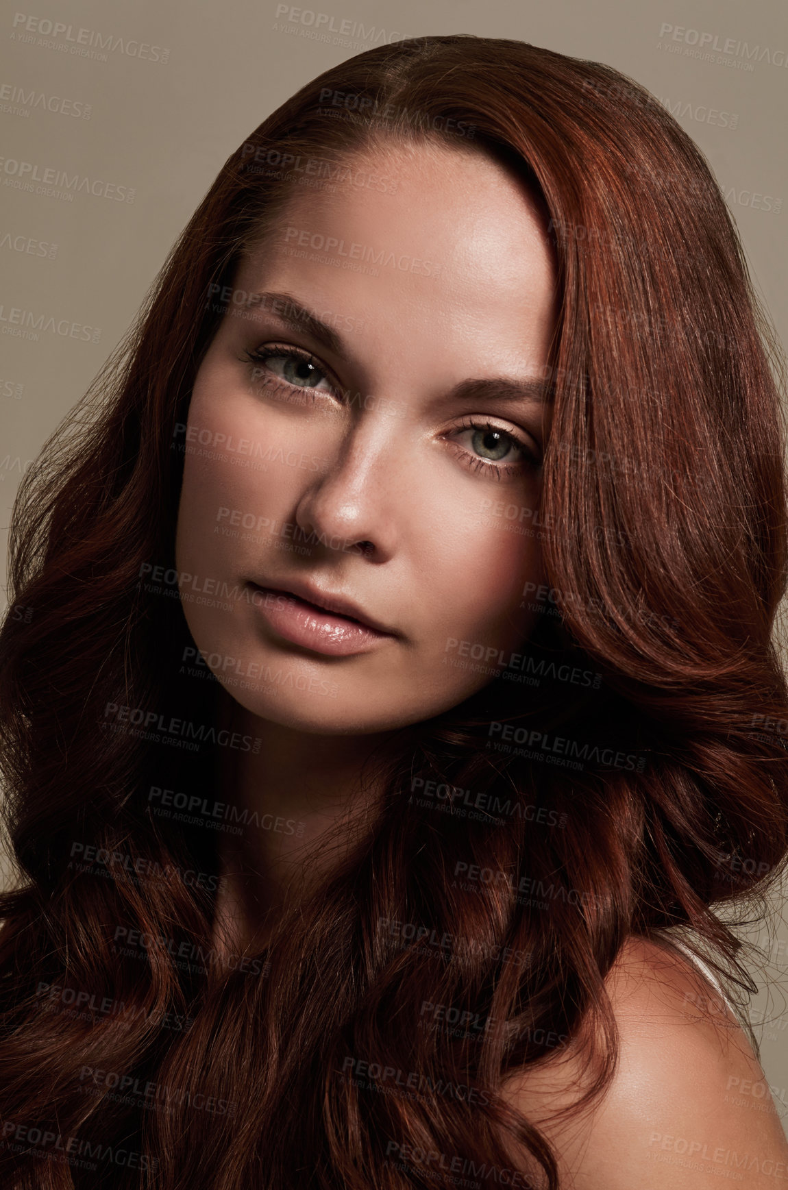 Buy stock photo Portrait, beauty and hair with a model woman in studio on gray background for makeup or skincare. Face, haircare and cosmetics with a young female red head at the salon or hairdresser for a makeover