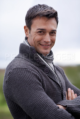 Buy stock photo Man, portrait and smile with arms crossed or sky for relax, travel and winter adventure on holiday or vacation. Person, tourist and face or happiness in nature or outdoor for fresh air and wellness