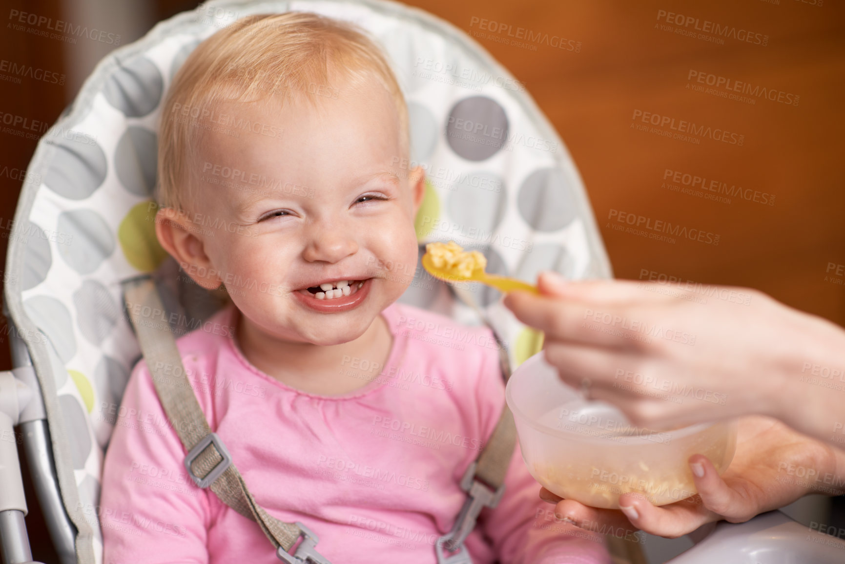 Buy stock photo Happy, baby and laughing from feeding in high chair at home in the morning ready for eating food. Youth, funny and smile of a infant with development and laughter in house with fun and joy of a child