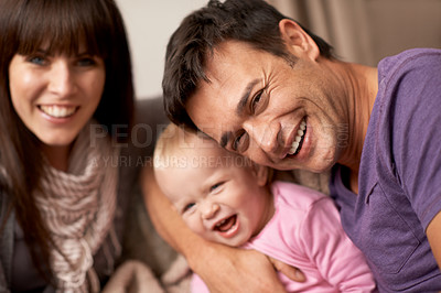 Buy stock photo selfie, love and baby with parents in a house for bonding hug, support or having fun together. Happy family, portrait or people embrace excited kid for profile picture memory or playing in their home