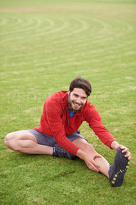 Buy stock photo Man, grass and stretching legs in portrait with exercise, training or fitness for health in summer. Guy, person and workout for body wellness with smile, pride or muscle on park lawn in England
