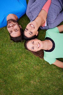 Buy stock photo Group, people and top view, portrait for fitness on grass and relax after workout for health and wellness together. Exercise, training club for sports and active in nature, support and trust outdoor