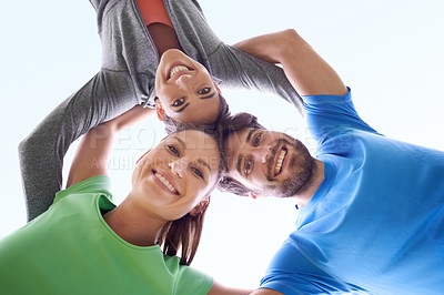 Buy stock photo Team, huddle and people in fitness with low angle portrait, workout together and support for health outdoor. Solidarity, sports and community training, exercise friends with smile and wellness