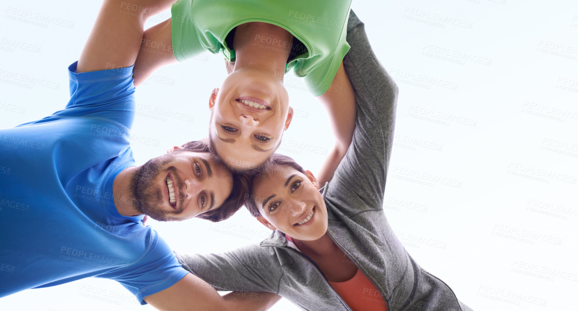 Buy stock photo Young people exercising outdoors