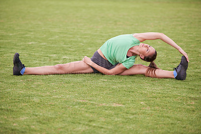 Buy stock photo Balance, stretching and woman on field for exercise, workout and training for running outdoors. Sports, fitness and person warm up for wellness, healthy body and flexibility for performance on grass