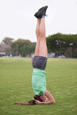 Buy stock photo Headstand, sport and woman with fitness in a park with balance for wellness and health. Training, workout and outdoor on a field with exercise on a lawn with pilates and strong core practice