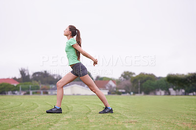 Buy stock photo Sports, stretching and woman on field for exercise, workout and training for running outdoors. Fitness, park and person warm up for wellness, healthy body and exercising for performance and balance