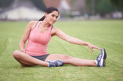 Buy stock photo Woman, grass and stretching legs in portrait with exercise, training or fitness for health in summer. Girl, person and workout for body wellness with smile, pride or muscle on field lawn in Australia