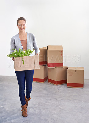 Buy stock photo Portrait, new home and woman with boxes, moving and real estate with rental apartment and property. Person, plant and girl with achievement and personal development with package and house on a loan
