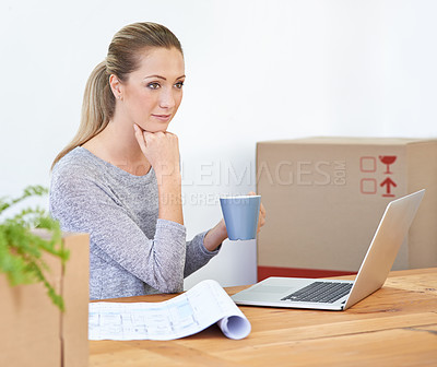 Buy stock photo Coffee, thinking and woman with a laptop, boxes and smile with decision, documents and startup. Person, employee and entrepreneur with computer or tech with courier or ideas with planning or choice