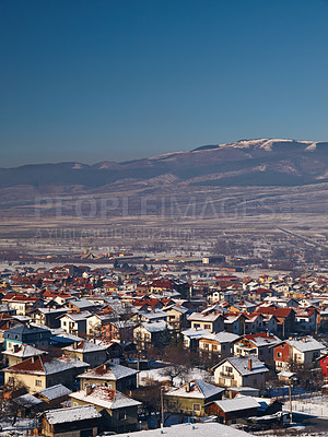 Buy stock photo Mountain, houses and village with snow in winter, landscape in Sweden or travel to vacation property. Europe, holiday and ice on real estate homes in town on hill with blue sky and environment