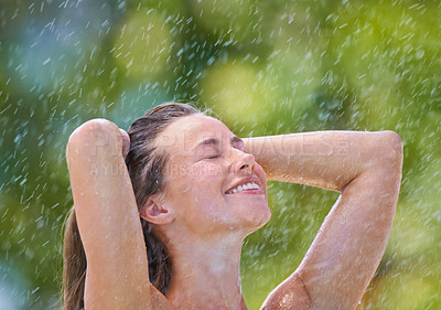Buy stock photo Rain, freedom and woman with celebration, nature and happiness with joy and winter air. Person, outdoor and girl with excitement and wellness with expression and wet with stress relief and cheerful