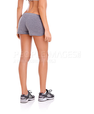 Buy stock photo Woman, athlete and legs in studio with fitness for exercise, workout and healthy body with training shoes. Model, person and rear view with sportswear or mockup space for wellness on white background
