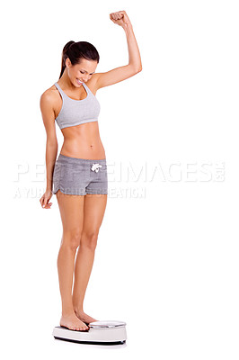 Buy stock photo Achievement, success and woman on scale in studio for weight loss, fitness or healthy diet for wellness. Body, exercise and person with motivation for workout, detox or gut health on white background
