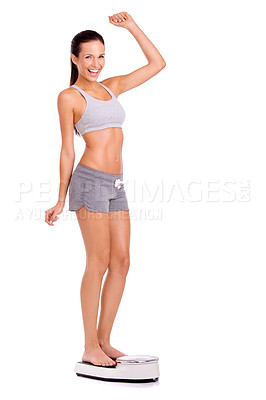 Buy stock photo Scale, celebration and portrait of woman in studio for weight loss, health and wellness diet victory. Happy, fitness and person measuring body for exercise, workout or training by white background.