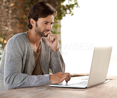 Buy stock photo Businessman, laptop and thinking of research outdoor with remote work, relaxing or freelance writer. Entrepreneur, person and technology for reading, typing and online planning in nature at cafe