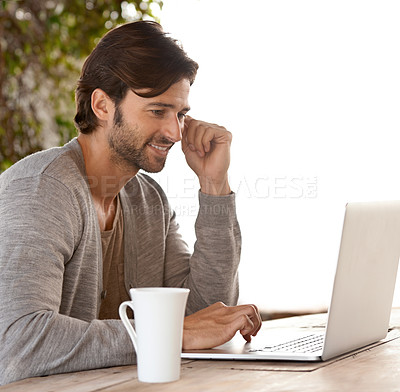 Buy stock photo Businessman, laptop and reading or research outdoor with coffee for remote work, happy and freelance writer. Entrepreneur, mature person and technology for relax and online planning in nature at cafe