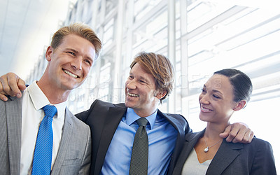 Buy stock photo Business people, together and confident in cooperation, embrace and pride in partnership. Happy coworkers, teamwork and collaboration or support in workplace, smiling and hugging for solidarity