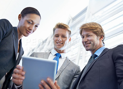 Buy stock photo Business people, tablet and plan or consulting in office, collaboration and unity for proposal. Coworkers, workplace and teamwork for reading a report, support and online for review and networking