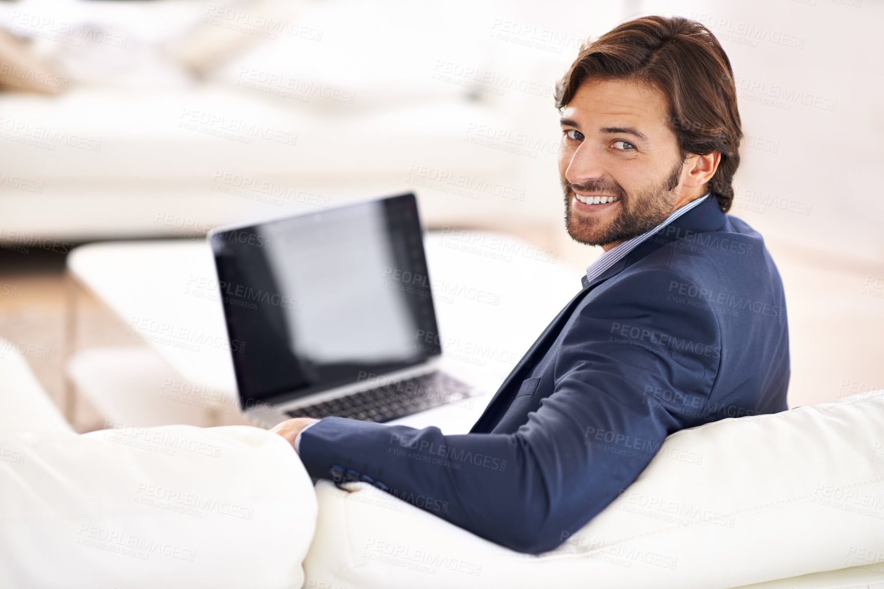 Buy stock photo Business, man and smile in living room with laptop on couch, remote work and small business with confidence in suit. Sofa, lounge and professional with online for information, startup and happy 