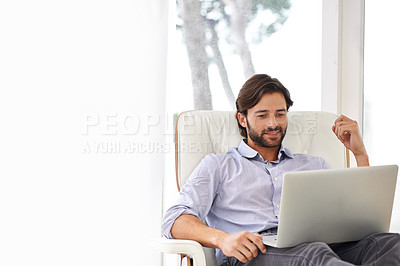 Buy stock photo Businessman, relax and sofa with laptop online for remote work, living room and home office for freelance job. Male person, social media and browsing or research on computer, couch and smile