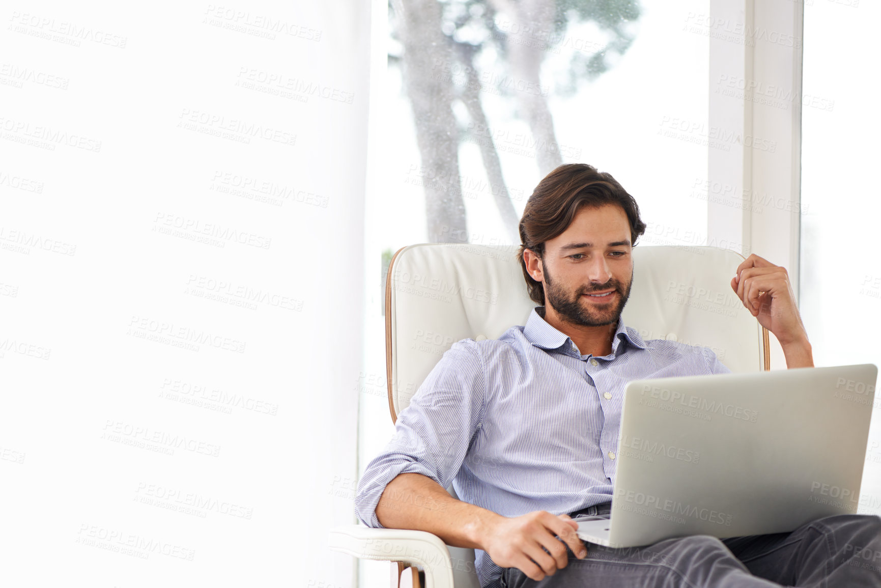 Buy stock photo Businessman, relax and sofa with laptop online for remote work, living room and home office for freelance job. Male person, social media and browsing or research on computer, couch and smile