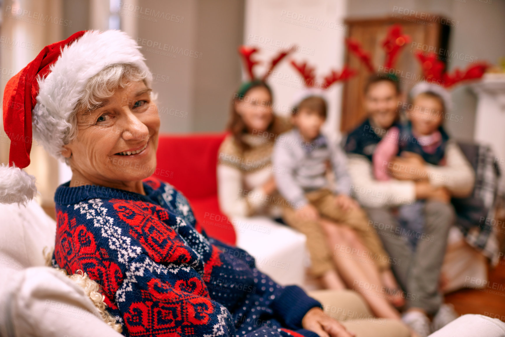 Buy stock photo A happy grandmother with her family on Christmas Eve