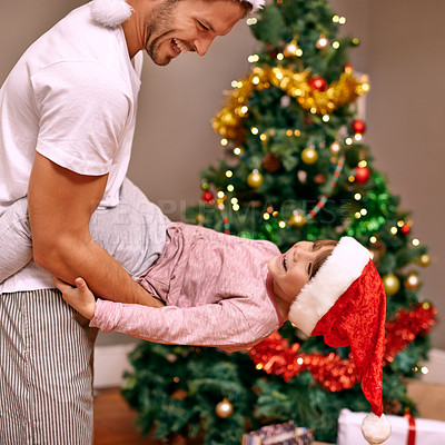 Buy stock photo Father, son and happy with bonding on christmas for celebration, playing and love in the morning with santa hats. Family, man and child with smile, relax and enjoying holiday season in lounge of home