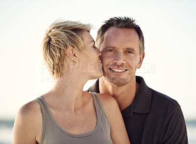 Buy stock photo Couple, hug and love together with kiss on forehead for relationship, commitment and happiness with trust. Man, woman and partnership with affection for romance, connection and dating for marriage