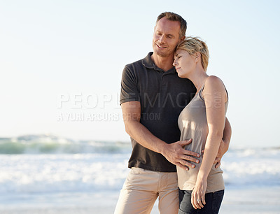 Buy stock photo Couple, love and happy on beach with hug for bonding, honeymoon date or weekend holiday in Maldives. Face, man and woman with embrace, smile or care by water at sea for vacation, travel and adventure