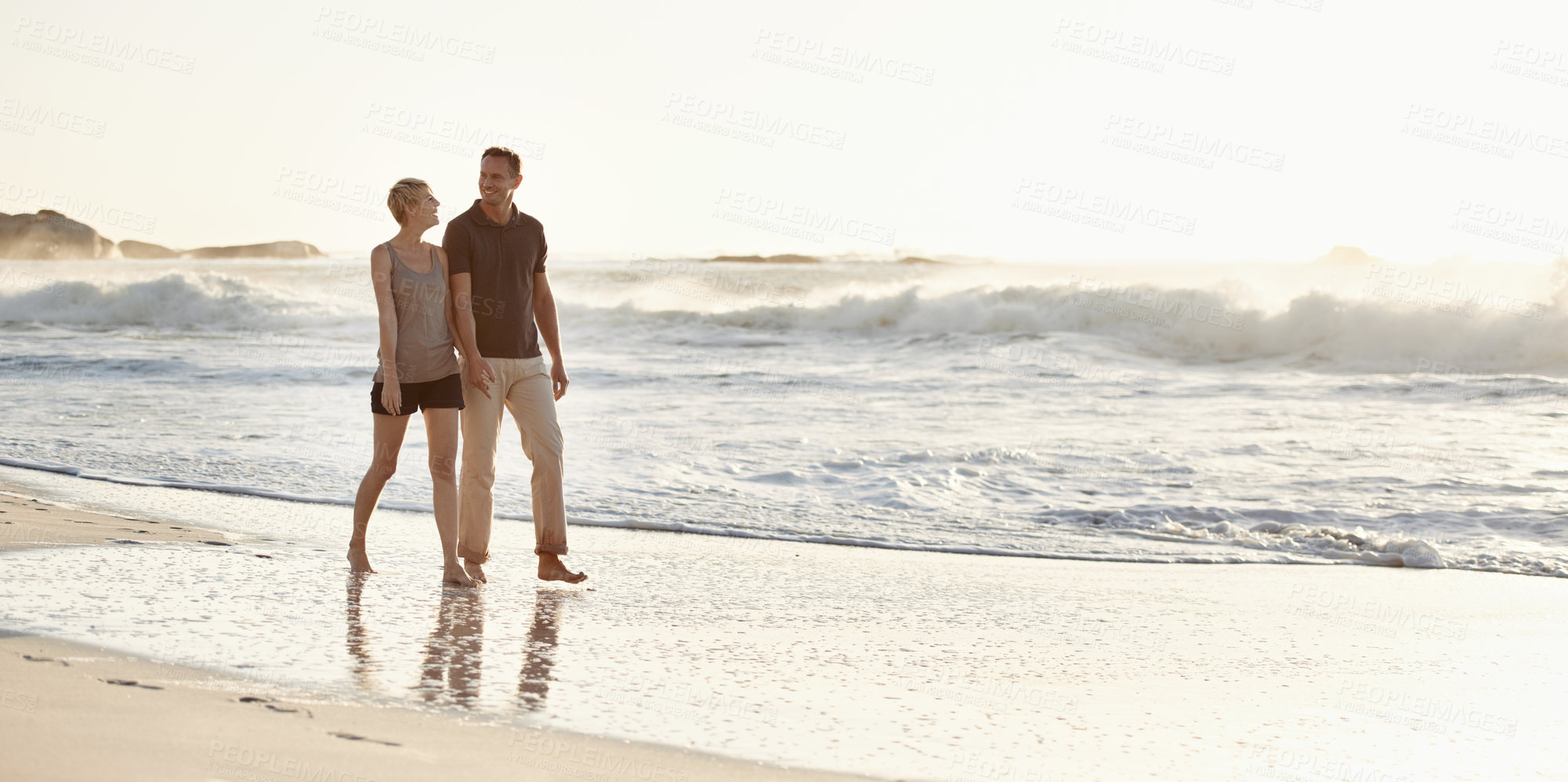 Buy stock photo A loving couple on the beach