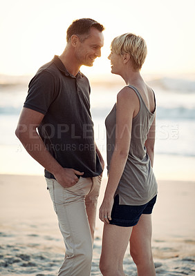 Buy stock photo Couple, love and happy on beach with bonding for honeymoon date and weekend holiday in Seychelles. Face, man and woman with relationship, smile and care on sea sand for vacation, travel and adventure