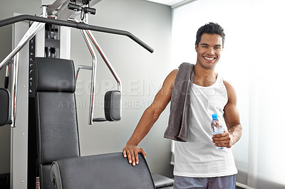 Buy stock photo Happy, portrait and man at gym with water bottle for recovery after exercise for body building. Healthy, fitness and person relax after workout with hydration for benefits to wellness in Mexico