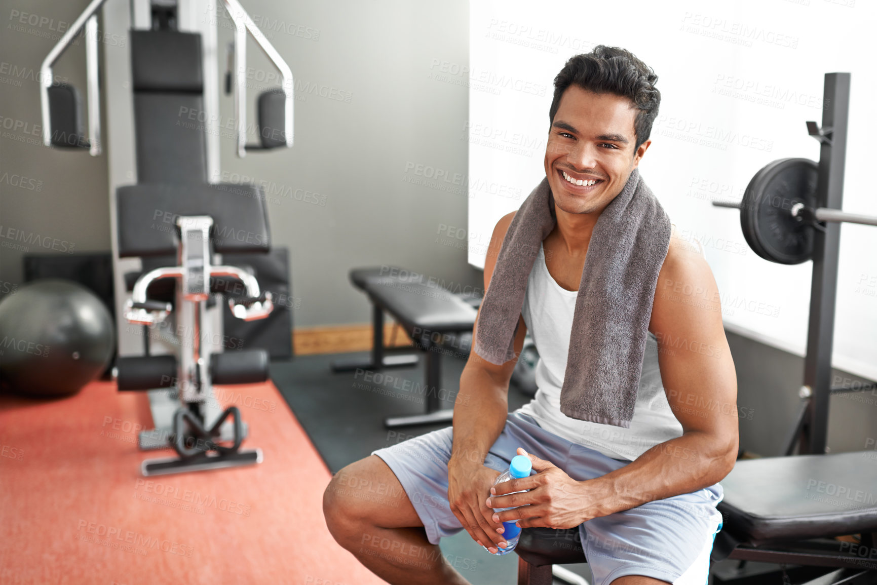 Buy stock photo Gym, portrait and happy man with water bottle for recovery after exercise and body building. Healthy, fitness and person relax after workout with liquid hydration for benefits to muscle and wellness