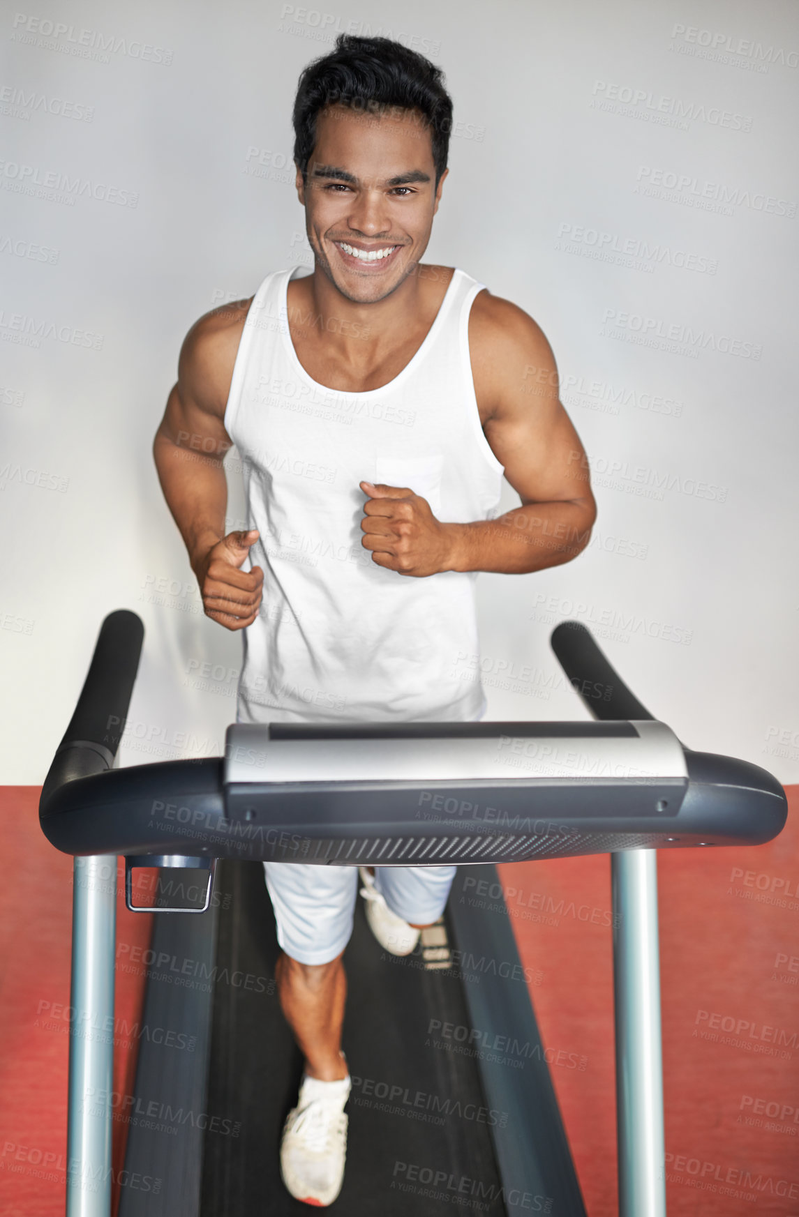 Buy stock photo Smile, fitness and portrait of man on treadmill in gym for health, wellness and body training. Happy, running and male athlete on cardio machine for speed exercise or workout in sports center.