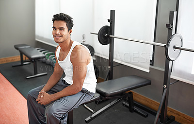 Buy stock photo Weights, bench and portrait of man at gym with happiness for workout as body builder in Mexico. Healthy, person and smile after weightlifting exercise for strong muscle, fitness and training arms 