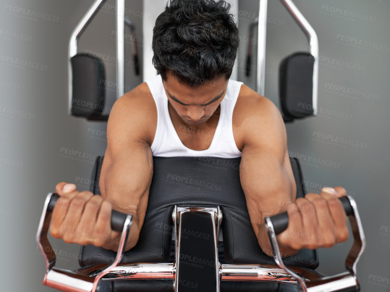 Buy stock photo Challenge, weights and man with gym machine, fitness and workout with endurance and progress. Bodybuilder, person and guy in a wellness center, strong and muscle with strength training and healthy