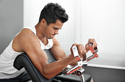 Buy stock photo Bodybuilder, power and man with gym machine, exercise or challenge with strength training or progress. Muscle, person or guy in health center, strong or fitness with endurance or athlete with weights