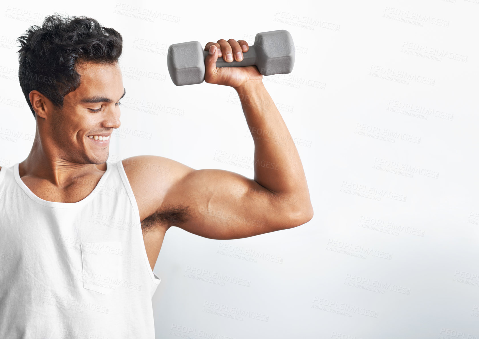 Buy stock photo Fitness, gym and happy man with dumbbell in studio for weightlifting, sports or mockup on white background. Training, face or male bodybuilder with space for power, performance or bicep challenge