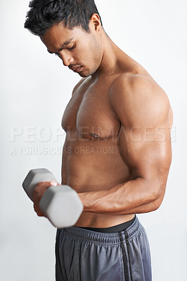Buy stock photo Man, workout and dumbbell exercise for arm endurance or gym routine for challenge, wellness or bodybuilder. Male person, equipment and white background in studio for training, shirtless or mockup