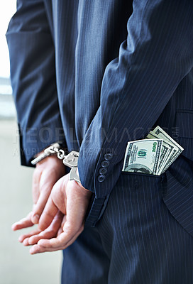 Buy stock photo Business person, hands and cash with handcuffs for bribe, secret or corruption in financial crime. Closeup or rear view of employee with pocket money, paper or laundering finance in bribery or fraud