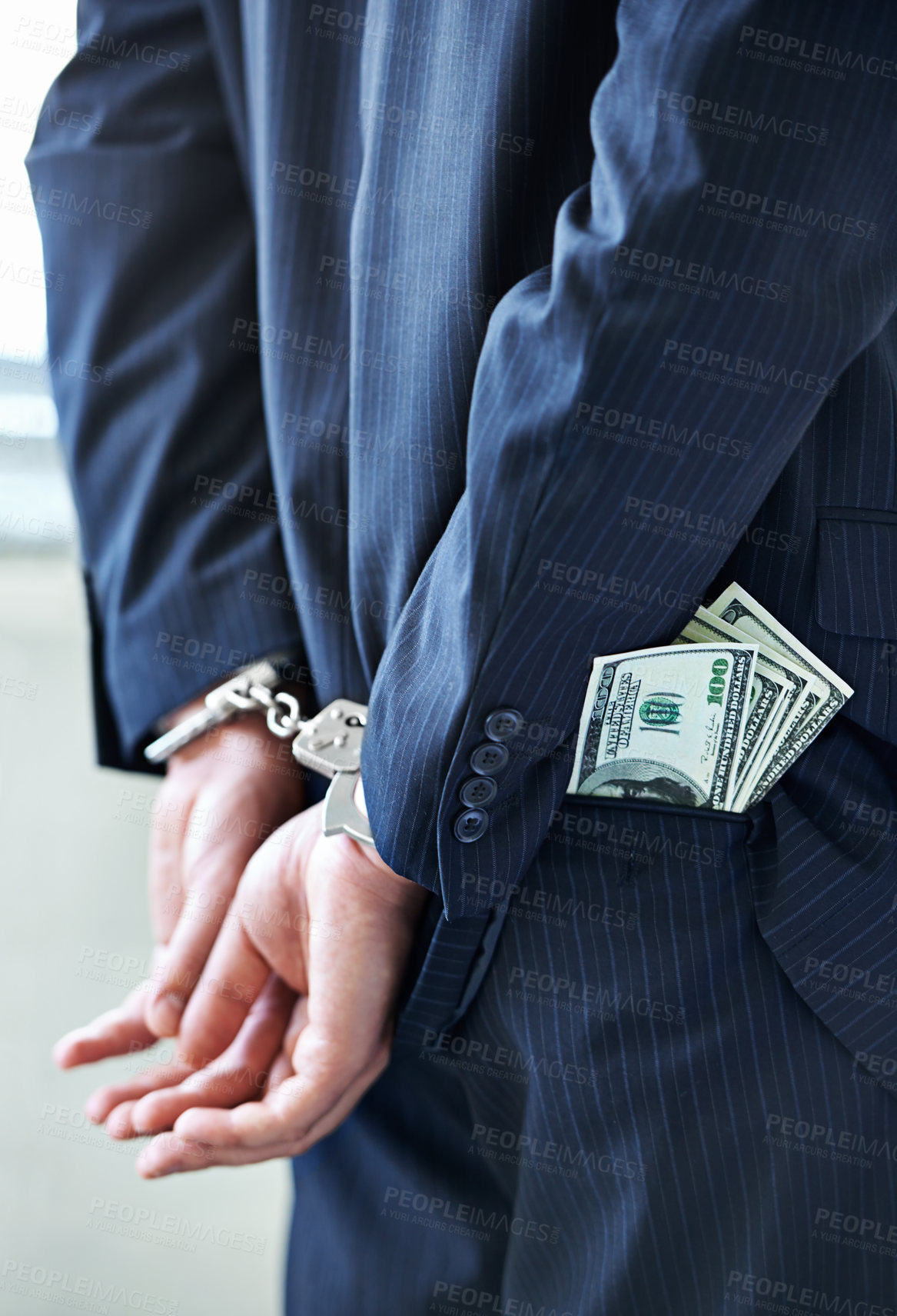 Buy stock photo Business person, hands and cash with handcuffs for bribe, secret or corruption in financial crime. Closeup or rear view of employee with pocket money, paper or laundering finance in bribery or fraud