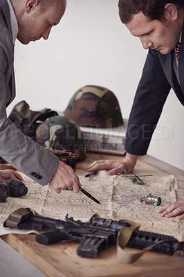 Buy stock photo Planning, map and men soldiers in military in discussion for war battlefield with guns. Teamwork, conversation and male army heros working on fighting strategy with paperwork for armed forces gear.