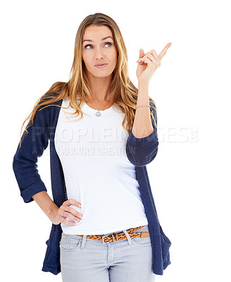 Buy stock photo Woman, pointing and contemplating a choice in studio, presentation and mockup space for information. Female person, direction and guide on white background, confusion and doubt for offer or sign