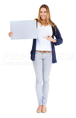 Buy stock photo Smile, showing poster and portrait of a woman isolated on a white background in a studio. Happy, mockup and a young lady with a blank paper sign for branding, news and an announcement or promotion