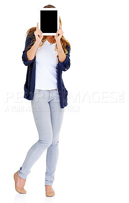 Buy stock photo A young woman holding a digital tablet in front of her face
