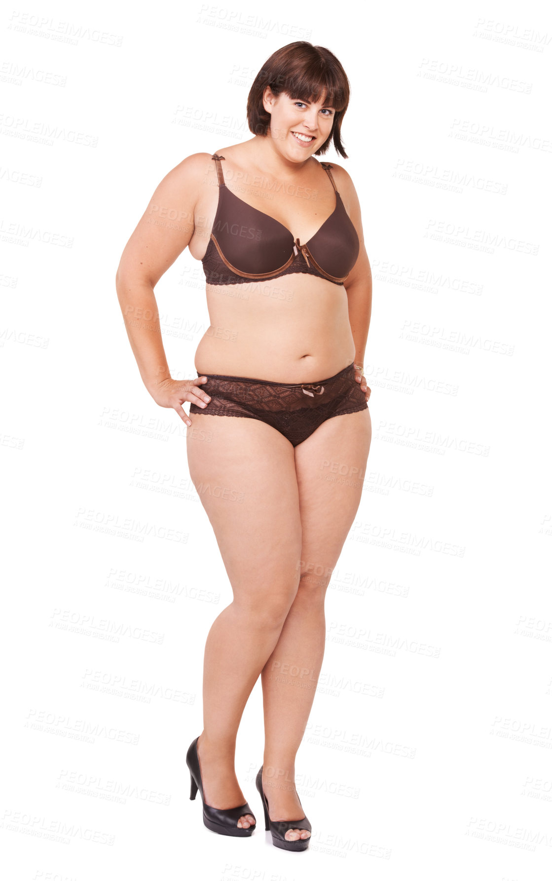 Buy stock photo Full length portrait of a voluptuous woman in lingerie on a white background